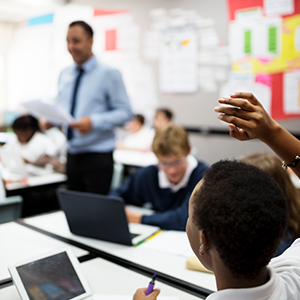 children and teacher in classroom