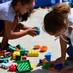 girls playing with bricks