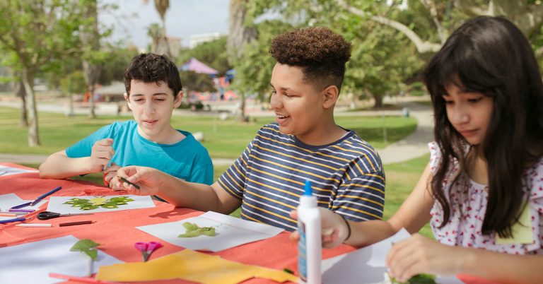 Elementary school students doing school activities outdoor