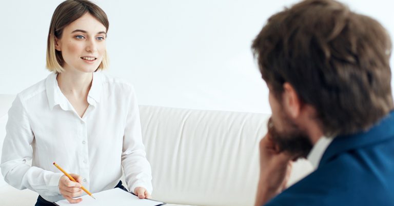 Therapist talking to the patient