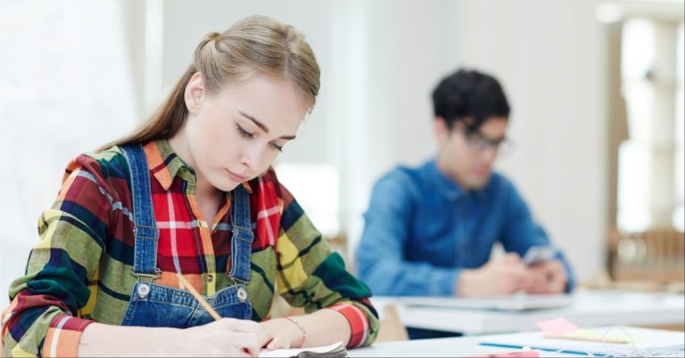 A girl and a boy at the exam