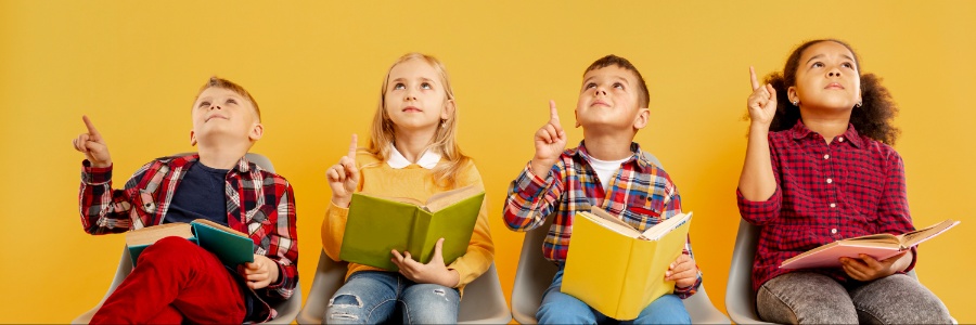 Children holding books and thinking
